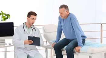 doctor talking to patient